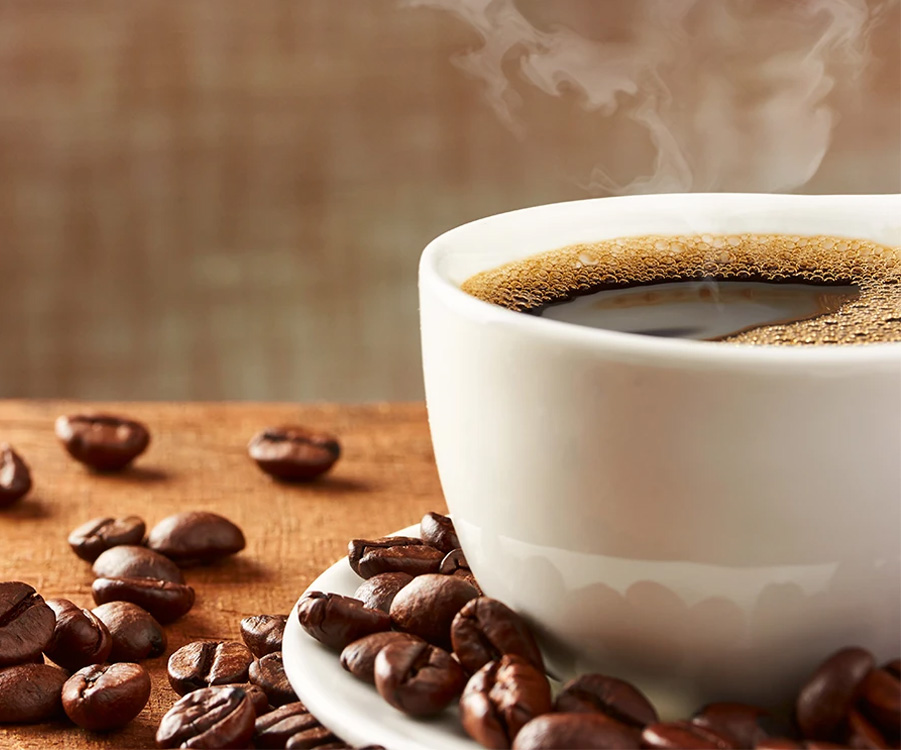 Coffee cup and beans